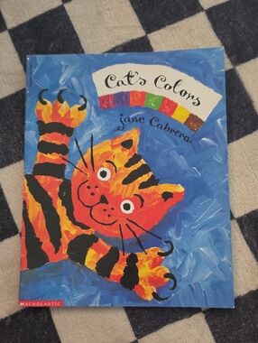 Scholastic Playful Orange & Black Tabby Cat Illustration